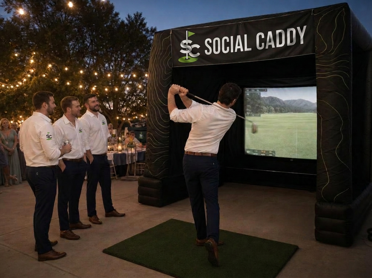 Guests playing the Social Caddy mobile golf simulator at weddings